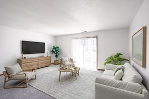 Sioux Falls apartment for rent - the living room of an apartment with a couch and a tv