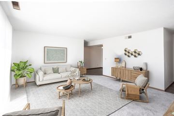 Sioux Falls apartment for rent - a living room with a white couch and a table