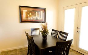 Glendale apartment for rent - a dining room table with chairs and a picture on the wall