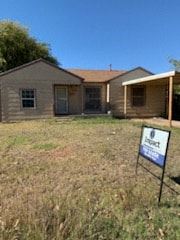 Abilene house for rent - A sign in front of a house that says "Sale".
