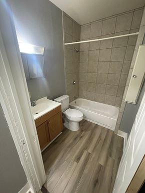 Abilene house for rent - a small bathroom with a toilet and a sink