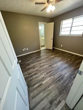 Abilene apartment for rent - a living room with a wooden floor and a ceiling fan