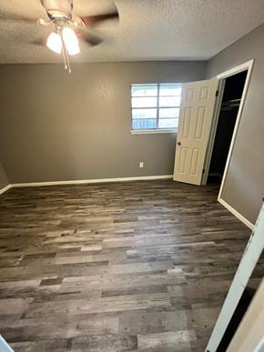 Abilene apartment for rent - a empty living room with wood flooring and a ceiling fan