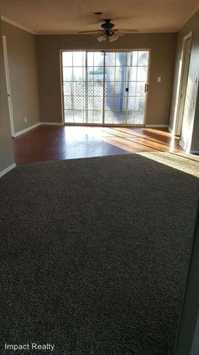 Abilene house for rent - an empty living room with a hard wood floor
