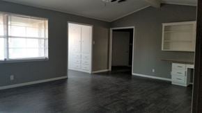 Abilene house for rent - A room with a desk and a window.