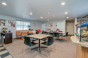 Watertown apartment for rent - a dining room with tables and chairs