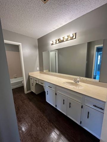 Abilene house for rent - a bathroom with a sink and a large mirror