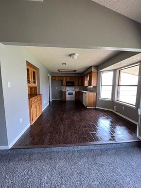 Abilene house for rent - a view of a empty living room and kitchen with wood floors