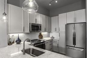 Charlotte apartment for rent - The Links Rea Farms Apartments in Waverly near Red Ventures - quartz countertops