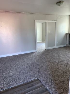 Abilene apartment for rent - A room with a carpeted floor and a doorway leading to another room.
