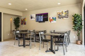 Stockton apartment for rent - Clubhouse seating with tables l Quailwood Apts in Stockton 