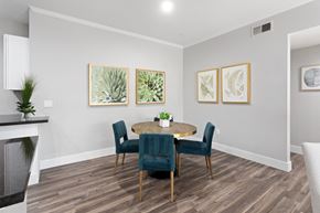 Scottsdale apartment for rent - the retreat dining room with table and chairs and fireplace