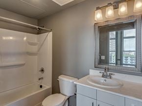 Chattanooga apartment for rent - a bathroom with a sink toilet and shower and a mirror