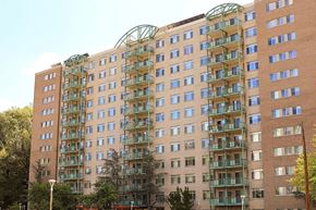 Takoma Park apartment for rent - a large apartment building with many balconies on the side of it