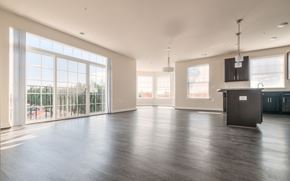 Frederick apartment for rent - Living Room Come Kitchen View at Village Center Apartments at Wormans Mill, Frederick, Maryland