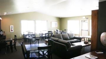 Filer apartment for rent - a living room and dining room with couches and tables