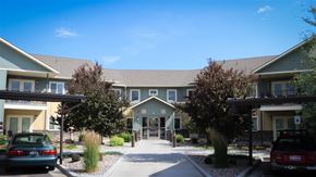 Idaho Falls apartment for rent - a building with cars parked in front of it