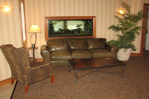 Nampa apartment for rent - a living room with a leather couch and a table