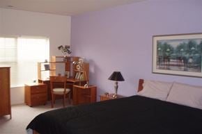 Nampa apartment for rent - a bedroom with a bed and a desk