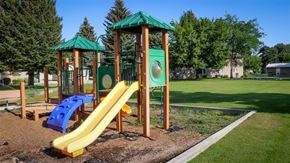 Shelley apartment for rent - children s playground with slides on a sunny day
