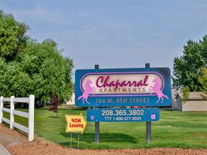 Emmett apartment for rent - a sign for the champlin apartments on the side of the road