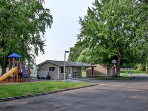 Emmett apartment for rent - a park with a playground and a small house