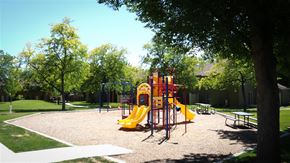 Twin Falls apartment for rent - a playground with a yellow swing set in a park