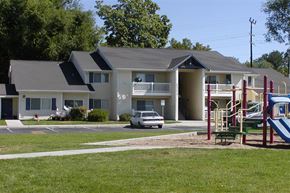 Nampa apartment for rent - a white car parked in front of a playground