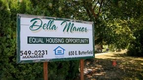 Weiser apartment for rent - a real estate sign in front of a tree
