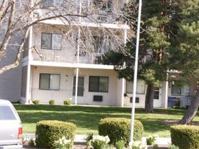Eagle apartment for rent - a white house with a car parked in front of it