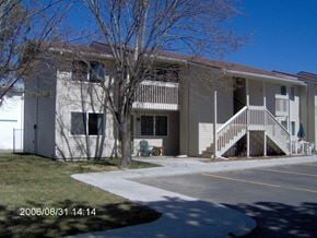 Gooding apartment for rent - a white house with a tree in front of it