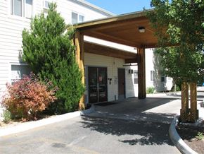 Caldwell apartment for rent - a covered entrance to a building with a driveway