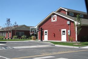 Nampa apartment for rent - a red building with a red fire hydrant in front of it