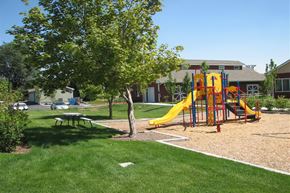 Nampa apartment for rent - a playground in a yard with a swing set