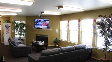 Twin Falls apartment for rent - a living room with couches and a television in it