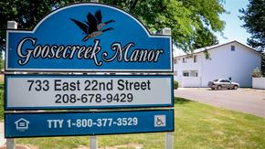 Burley apartment for rent - a blue sign that reads and a street