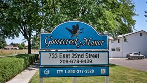Burley apartment for rent - a blue sign that reads on a street