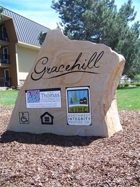 Gooding apartment for rent - a rock in the grass with a sign on it