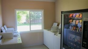 American Falls apartment for rent - a kitchen with a refrigerator and a window