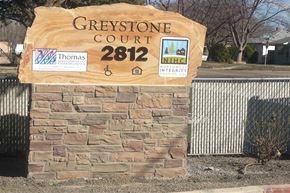 Caldwell apartment for rent - a stone sign for the greystone court