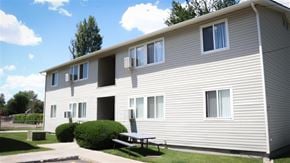Mountain Home apartment for rent - a white house with a picnic table in front of it