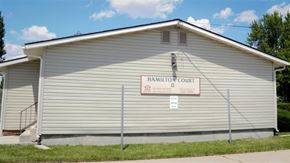 Mountain Home apartment for rent - a white building with a sign on the side of it