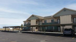 Lewiston apartment for rent - a building with a car parked in a parking lot