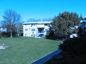 Boise apartment for rent - an apartment building with a yard in front of it