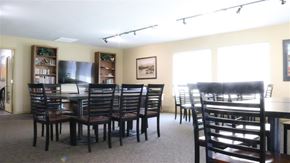 Rexburg apartment for rent - a dining room with a table and chairs