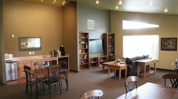 Emmett apartment for rent - a living room with tables and chairs and a couch