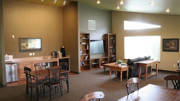 Emmett apartment for rent - a living room with tables and chairs and a couch