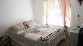 Jerome apartment for rent - a bedroom with a bed with a quilt on it