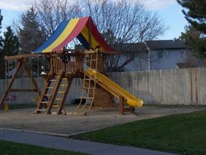 Nampa apartment for rent - a playground with a swing set and a slide