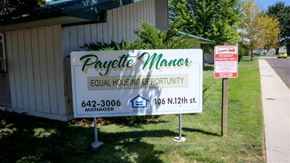 Payette apartment for rent - a real estate sign in front of a house